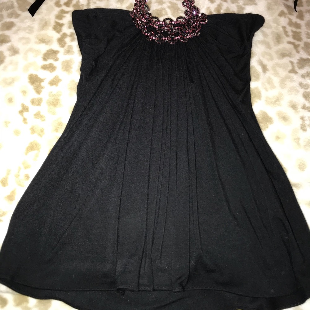 SKY top with pick jewels around neck.